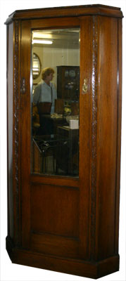 Attractive 1920's oak corner wardrobe/cupboard