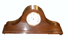 Antique "Napoleon Hat" style mahogany wind up clock
